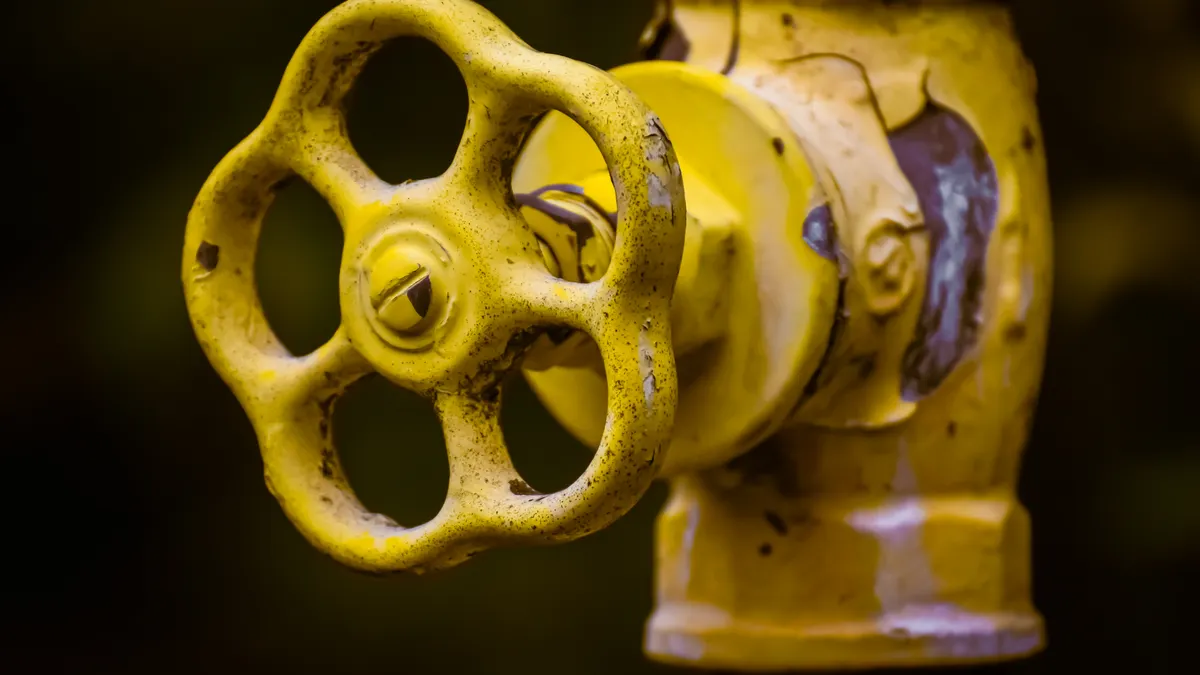 Emergency Plumber: What to Do Before the Plumber Arrives Yellow main water valve handle